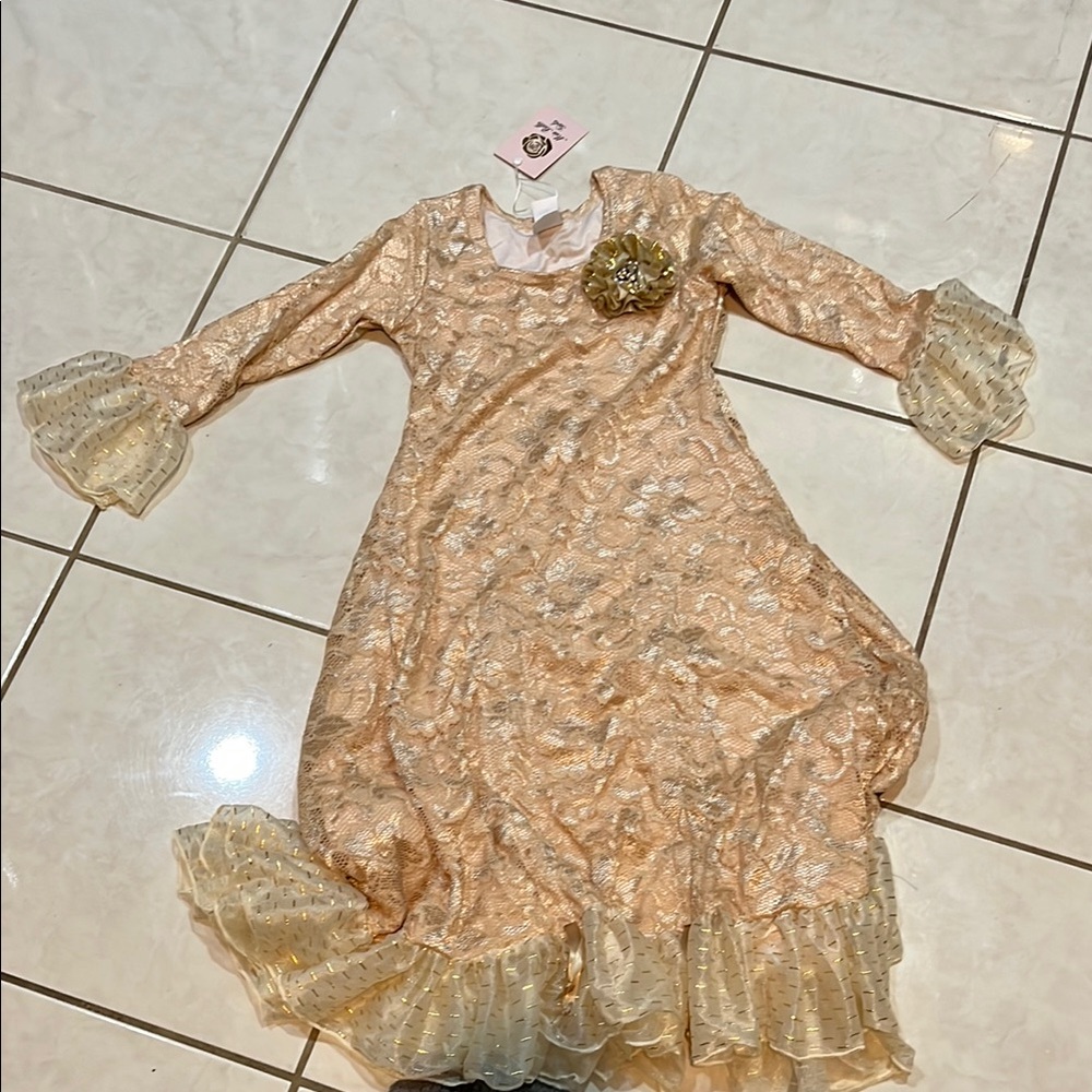 Elegant Gold and Cream Formal Gown with Flowing Skirt